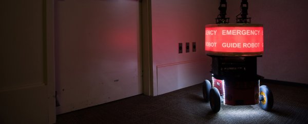 Would you trust a malfunctioning robot in an emergency? These people did