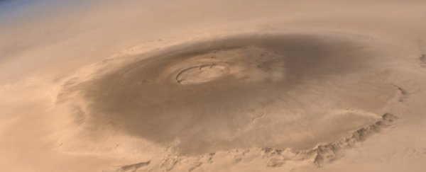 Ancient space rocks could be key to the mystery of insanely huge volcanoes on Mars