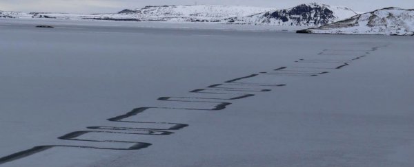 A rare natural phenomenon has left eerie zig-zag patterns on a frozen lake in Iceland
