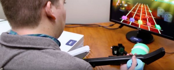 World-first device lets paralysed man move his hand with his mind