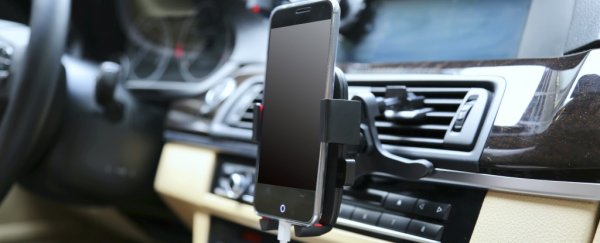 Hands-free mode might be just as distracting as holding your phone while driving