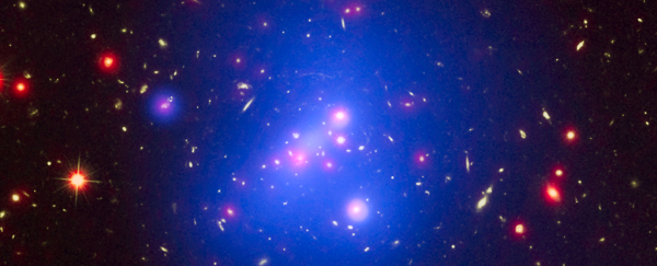 This extremely massive galaxy cluster weighs as much as 500 trillion Suns