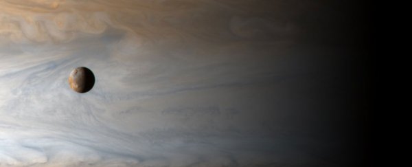 Jupiter is humongous, and this photo of its hellish moon proves it