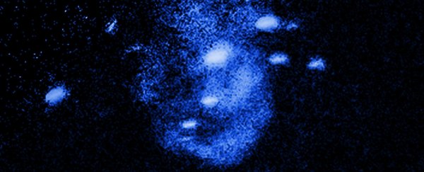 Galactic 'burp' shows black holes can also create, not just destroy