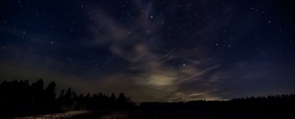 Astronomers think they've finally figured out why the sky is dark at night