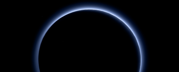 Our first glimpse at the colour of Pluto's atmosphere reveals blue skies, red ice