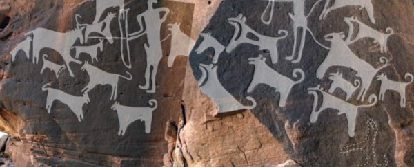 This 8,000-year-old rock art is the earliest depiction of domesticated dogs