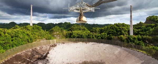 The iconic Arecibo telescope in Puerto Rico is being battered by Hurricane Maria