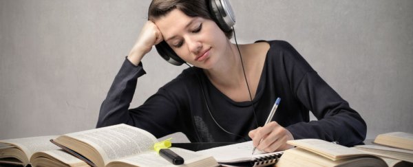 Listening to music at work could be messing with your brain function