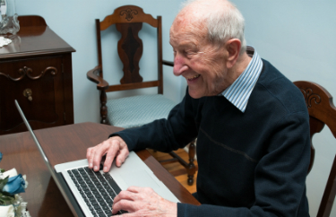 AWelshLad_OldManWithComp_iStock